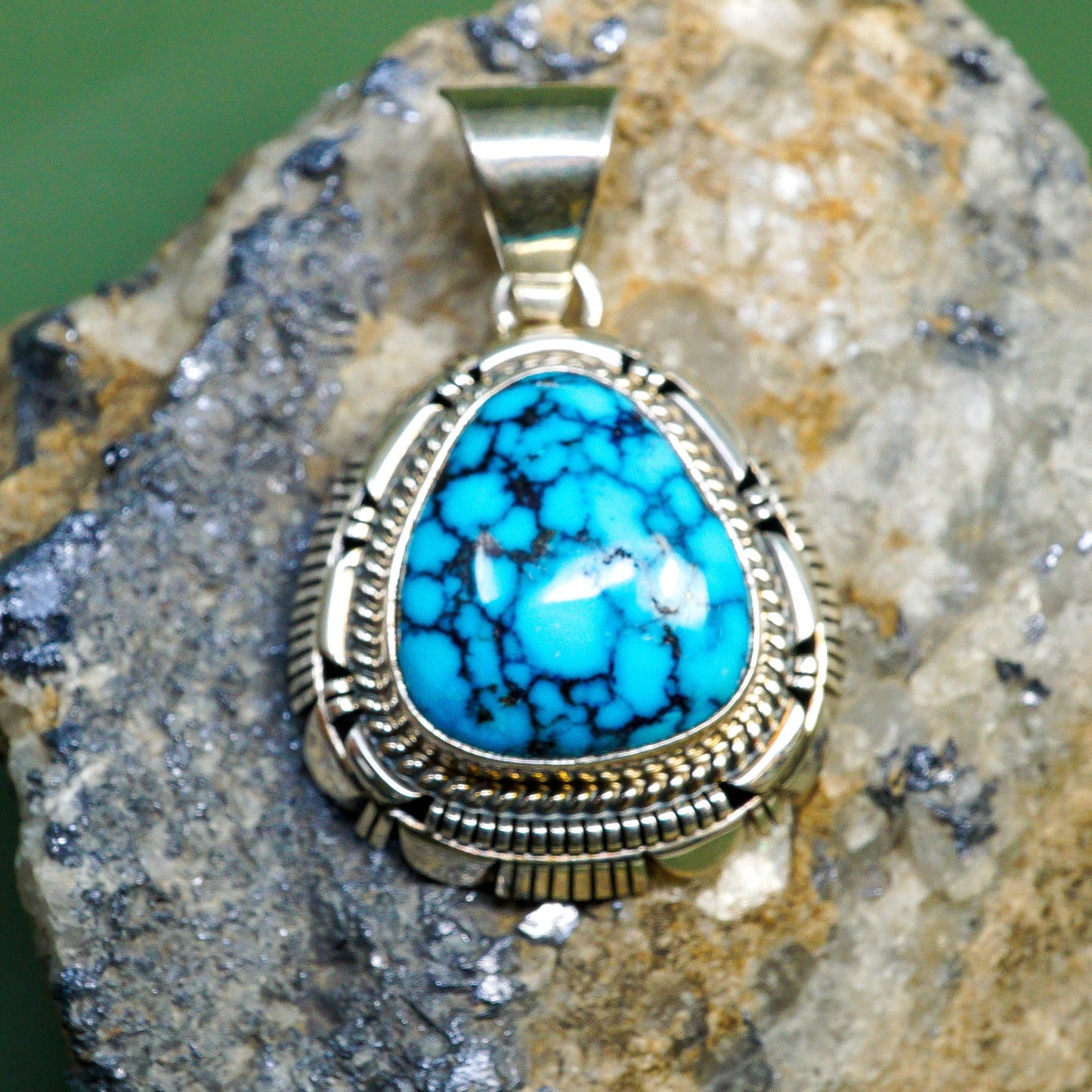 Red Web Kingman Turquoise set in Sterling Silver Pendant