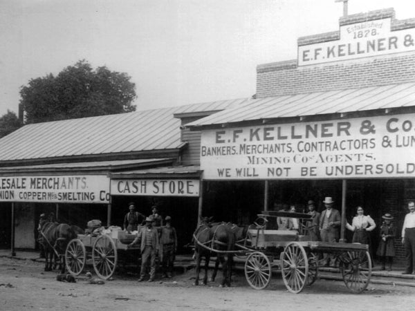 E.F. Kellner & Co. storefront with horse-drawn wagons