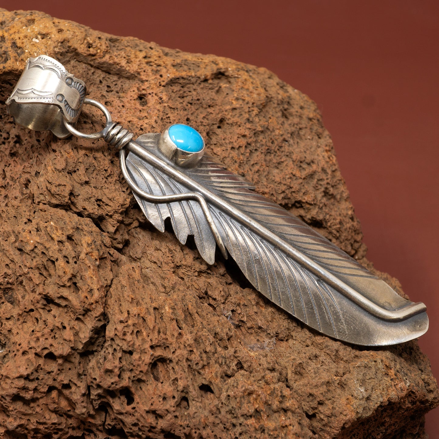 Sterling Silver Feather Pendant with Sleeping Beauty Turquoise