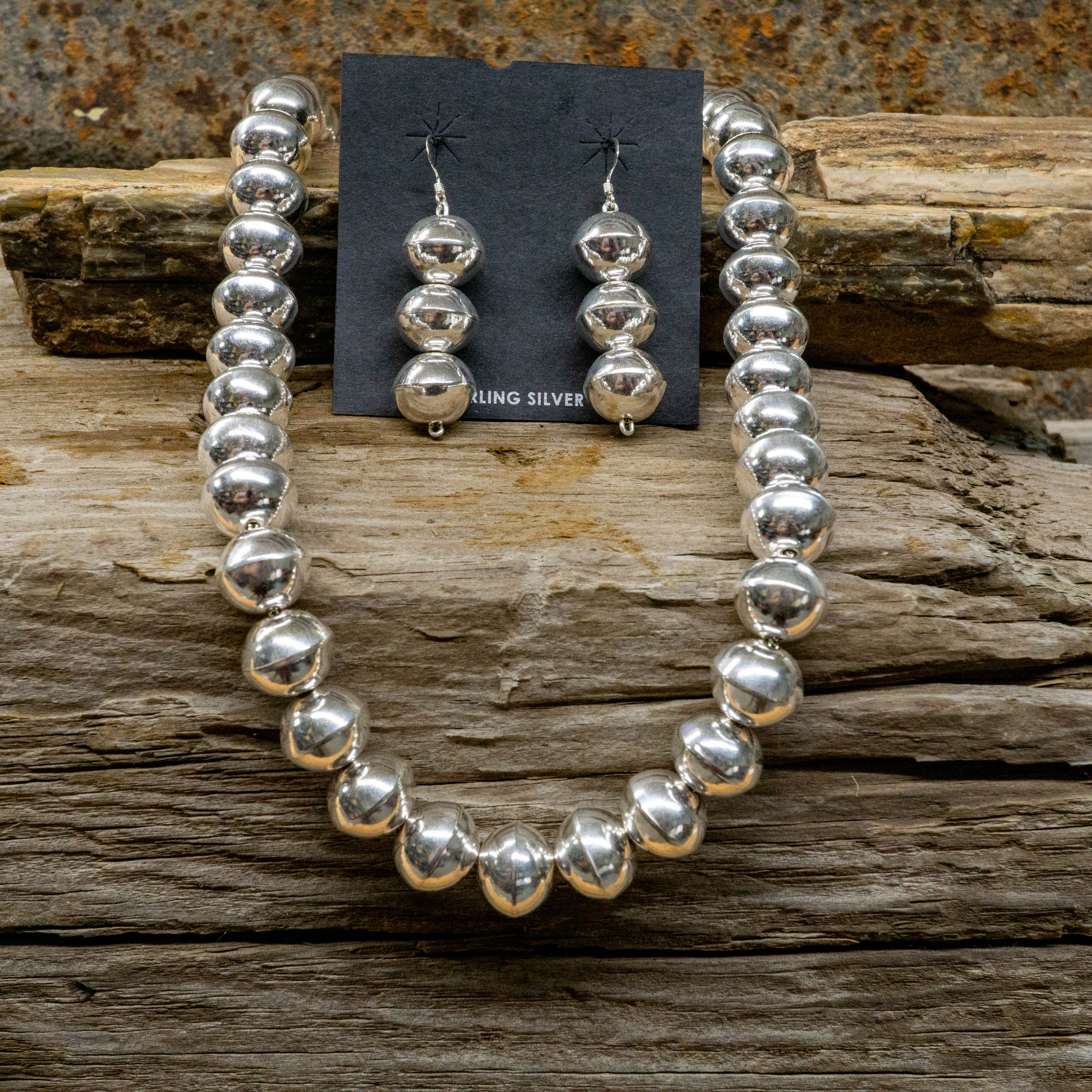 Pearl necklace and store ear rings