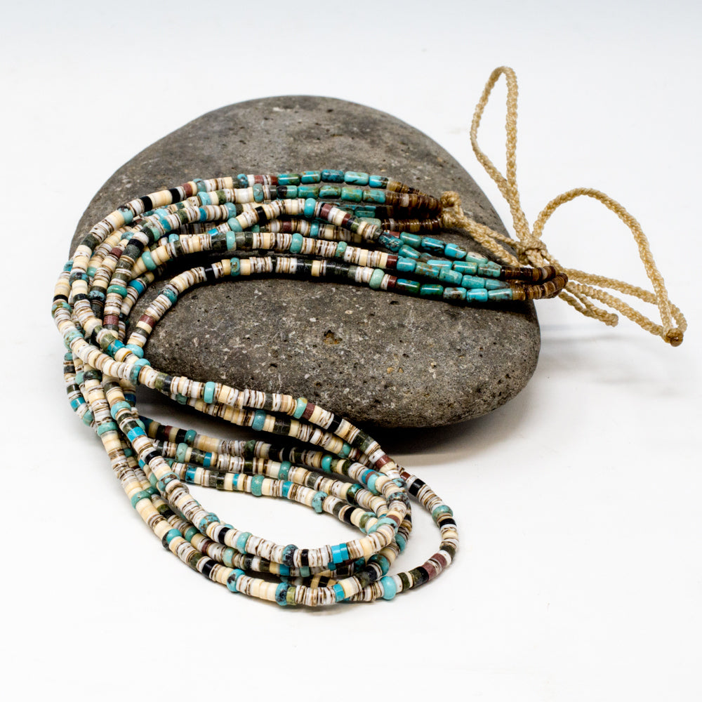 Priscilla Nieto's thick disc turquoise beads are mixed with multiple stones and shells in a spectacular necklace.